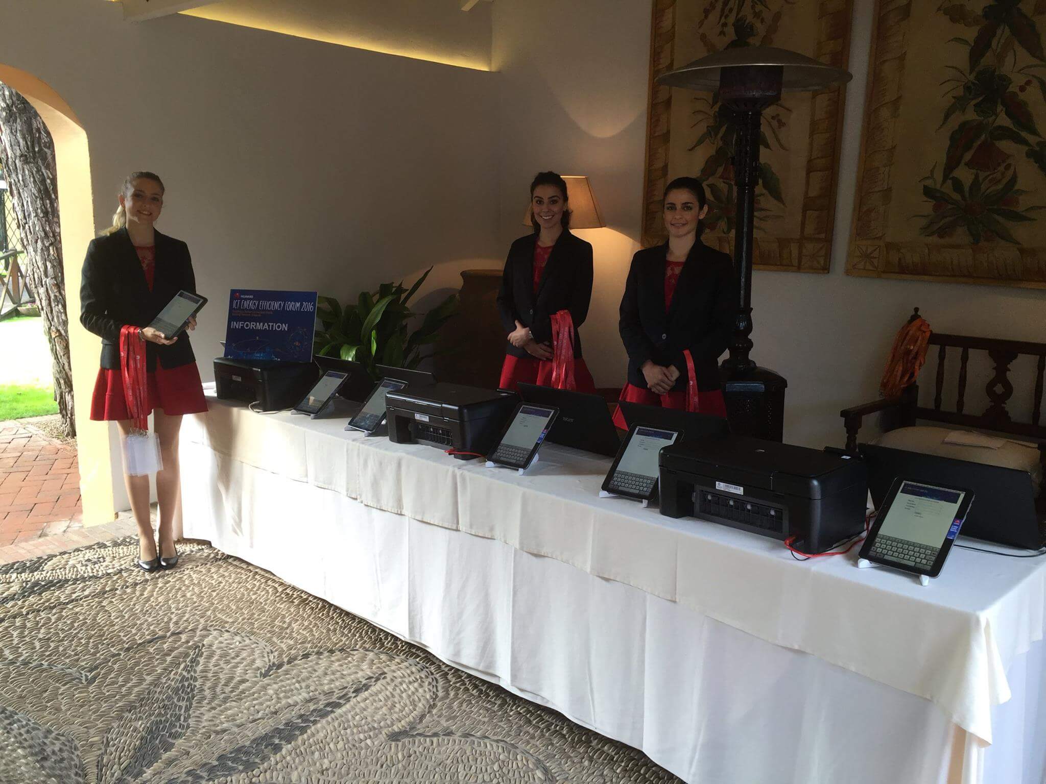 hostesses showing registration system